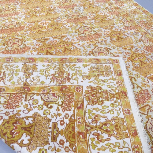 2118 - A yellow-ground Ushak rug. 190x122cm.