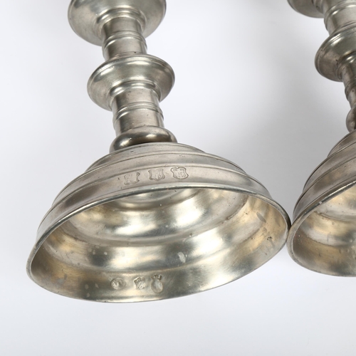 818 - A pair of pewter pricket candlesticks with touch marks, 31cm