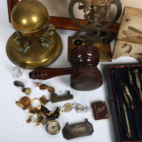 827 - A Victorian brass desk stand, supported by 3 hounds, 13cm, a balance scale, swan moulds, gavel, fold... 