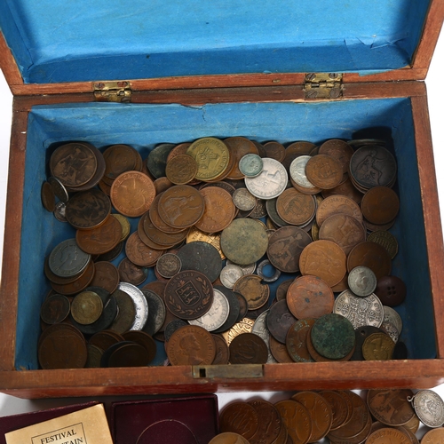 829 - A box containing various English pre-decimal and commemorative coins