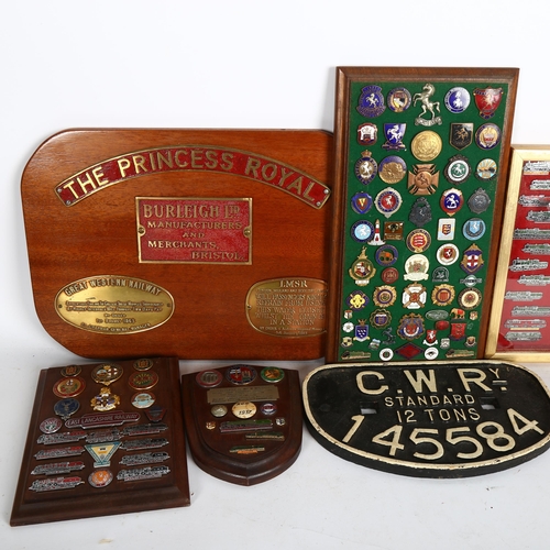 876 - A large quantity of various railway badges and a cast iron railway sign