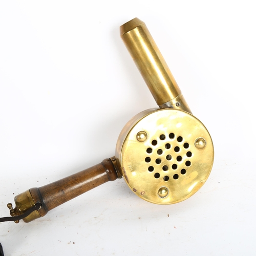 878 - An early electric brass hair dryer with turned wood handle, 26cm