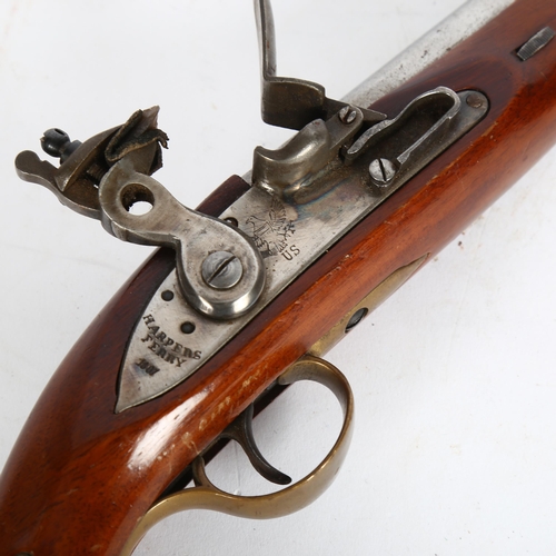 890 - A reproduction flintlock pistol, 41cm