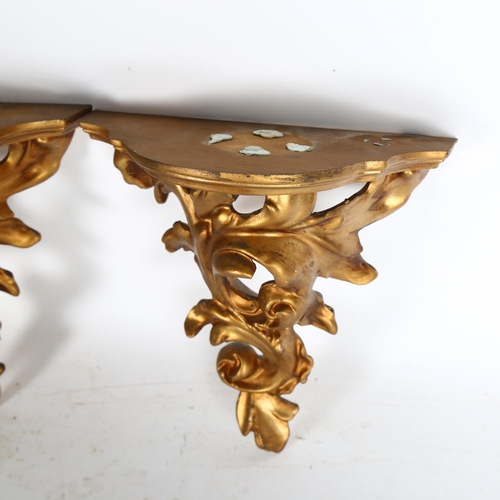 895 - A pair of composition Florentine style wall brackets, W20cm