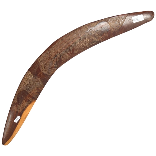 903 - A 1930s Australian carved wood boomerang, plus 2 hardwood African walking sticks, 1 with a Native he... 