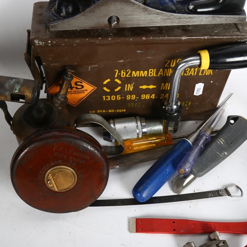 912 - A Param woodworking plane, Chesterman tape, blow torch, ammunition tin etc