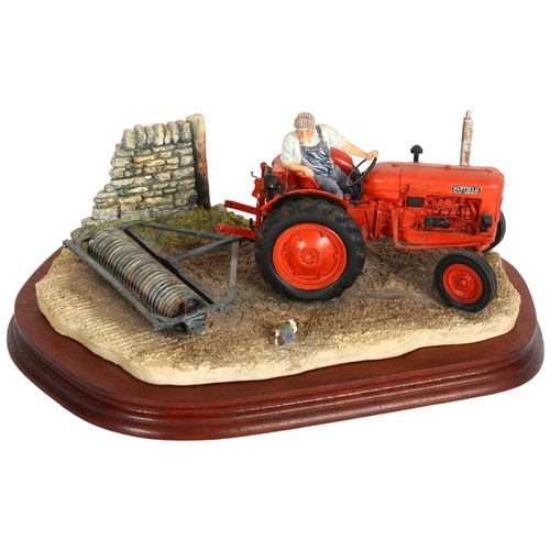 922 - Border Fine Arts sculpture of a tractor driver, 