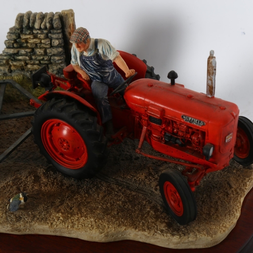 922 - Border Fine Arts sculpture of a tractor driver, 