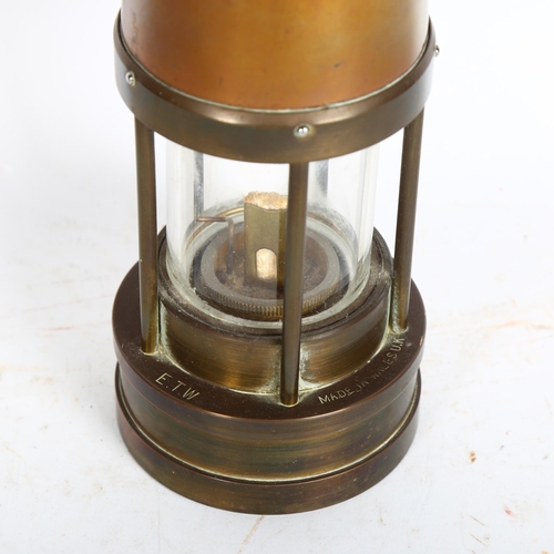 935 - A miner's safety lamp, with inscription for E. Thomas & Williams Ltd, Cambran, maker's Aberdare, Wal... 