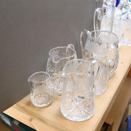 944 - A group of Royal Brierley English crystal-cut glass jugs, largest height 24.5cm (6)