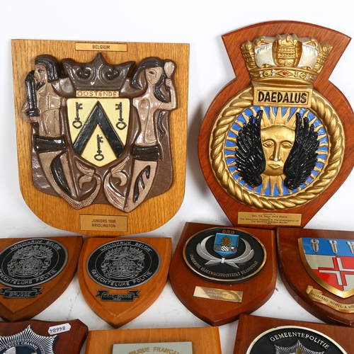 954 - A group of Vintage wooden police plaques, plaques relate to various foreign police forces, including... 