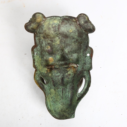 965 - A bronze verdigris laughing Buddha door knocker, L20cm