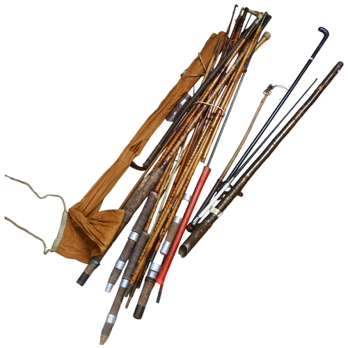 971 - A collection of Vintage bamboo and other fishing rods, walking cane etc