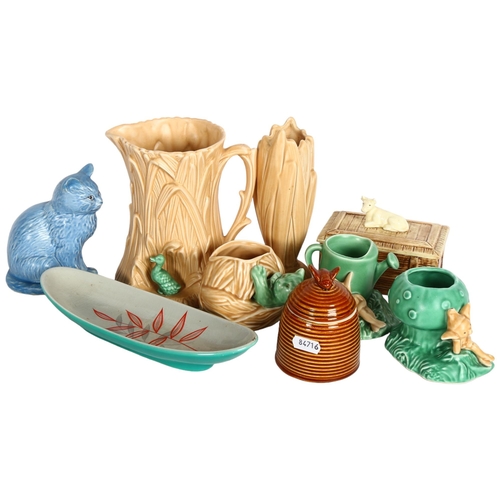 972 - A group of various Sylvac ornaments, including Fauna jug and matching vase, a pixie watering can and... 