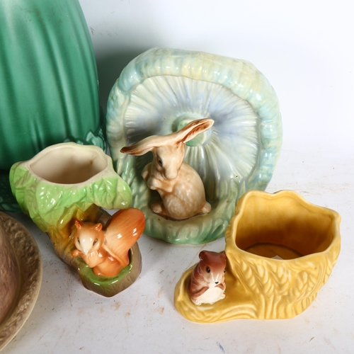 984 - A group of various Sylvac ornaments, including a squirrel jug, cheese dish and cover etc