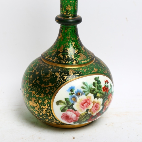 1061 - A Bohemian green glass and gilded bottle vase, with floral painted panels, H20.5cm