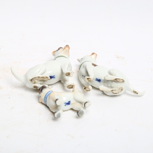 1097 - A group of 3 Meissen porcelain dog figurines, all stamped to the underside with crossed blue swords,... 