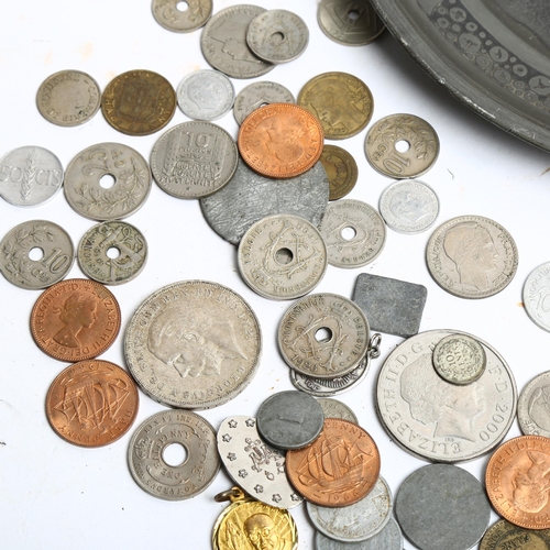 1108 - A pewter plate with various coins embossed to the middle section, and a quantity of various other co... 