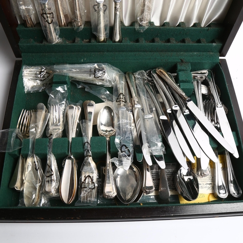 1205 - ROBERTS & DORE - a canteen of stainless steel cutlery