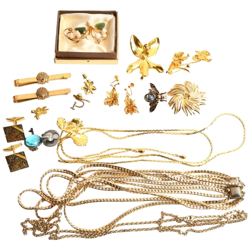 1231 - A quantity of gilt-metal costume jewellery, including items by Risis, floral design brooches, neckla... 