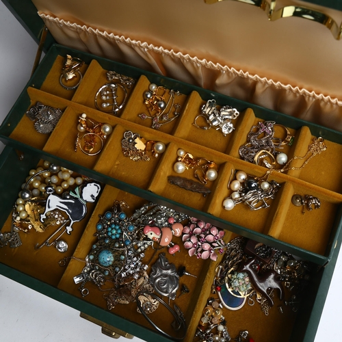 1245 - An assorted collection of various silver and other costume jewellery, in a cantilever jewellery box