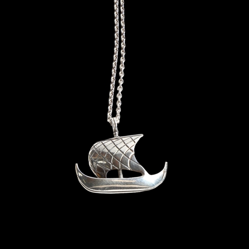 1248 - FRANS MAGNUSSEN - a sterling silver Viking longboat pendant and chain