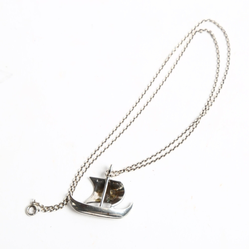 1248 - FRANS MAGNUSSEN - a sterling silver Viking longboat pendant and chain