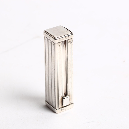 1249 - A novelty silver-cased mechanical lipstick holder, with sliding mechanism