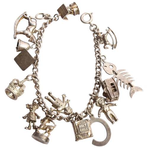 1284 - A silver charm bracelet and charms