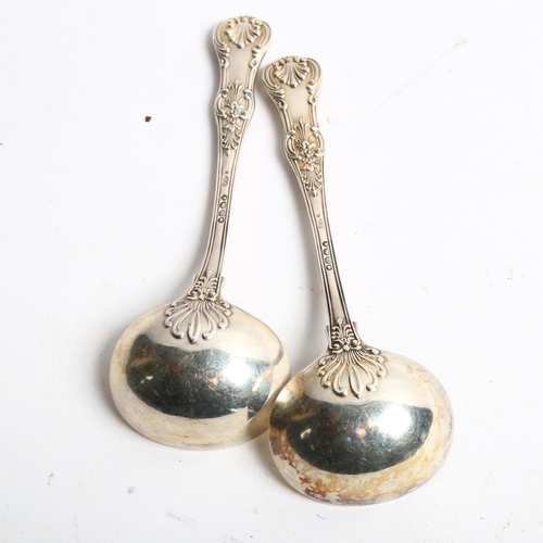 1301 - A pair of Victorian King's pattern silver ladles, L18cm, 5.5oz, hallmarks for London 1863