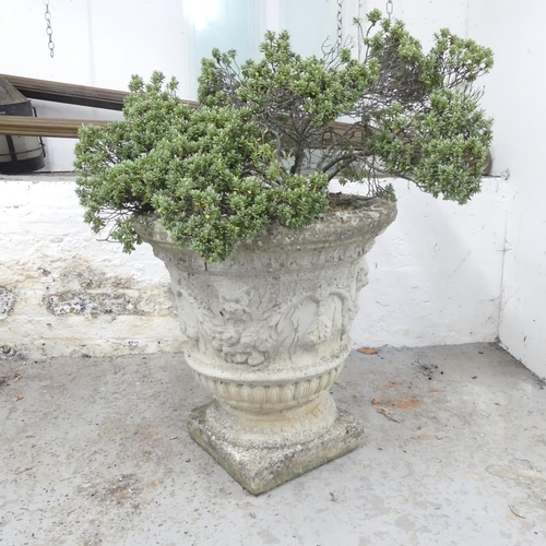 2665 - A weathered concrete garden urn. 50x50cm.