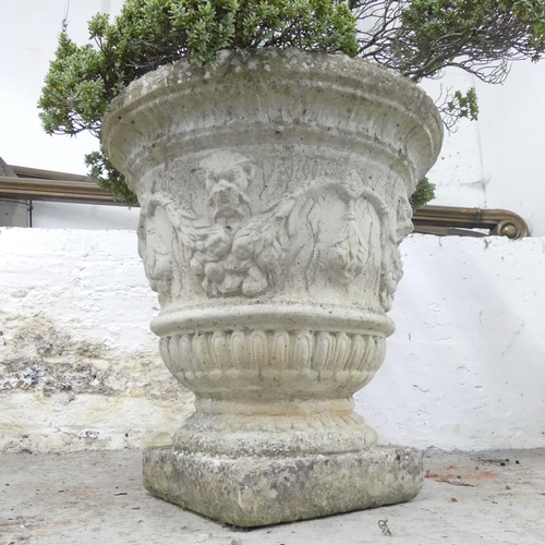 2665 - A weathered concrete garden urn. 50x50cm.