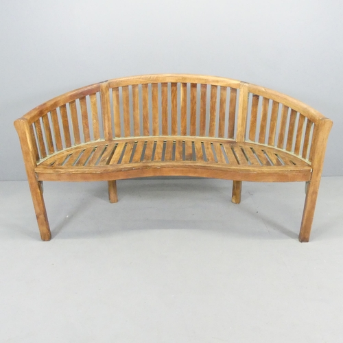 2667 - A handmade teak Lutyens style banana garden bench. 155x85x60cm.