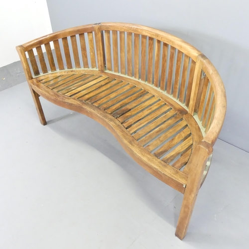 2667 - A handmade teak Lutyens style banana garden bench. 155x85x60cm.