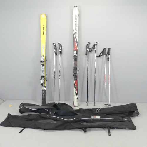 2680 - Two pairs of skis, by Head and Rossignol, and three pairs of poles, with carrying bags.