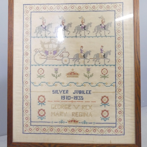 2691 - A George V silver jubilee sampler in glazed fire screen, 46x72cm, and an oak swing dressing mirror. ... 