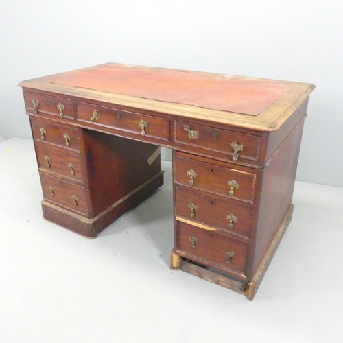 2694 - A Victorian mahogany twin pedestal writing desk, with nine drawers. 122x75x68cm. A/F.