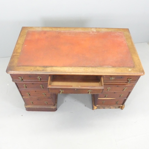 2694 - A Victorian mahogany twin pedestal writing desk, with nine drawers. 122x75x68cm. A/F.