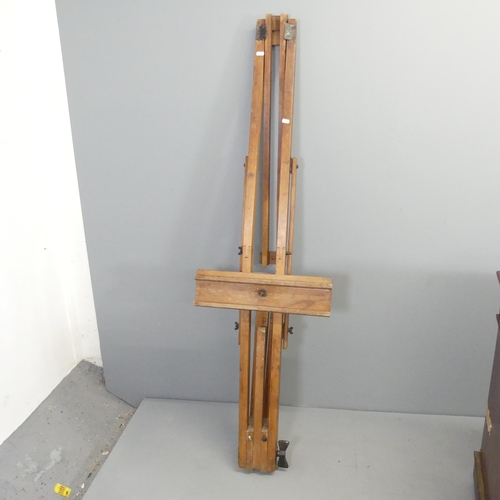 2695 - A Windsor & Newton folding adjustable floor standing artists' easel.