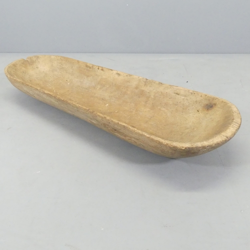 2632 - An oak baguette dough bowl / trough. 108x14x35cm.