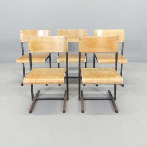 2636 - A mid-century set of five stacking child's school chairs, with ply seats and backs on metal frame. O... 