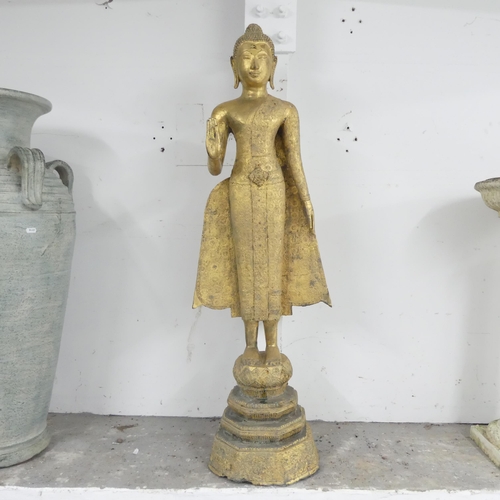 2649 - A gilt metal garden statue, study of an eastern figure. 40x122cm.