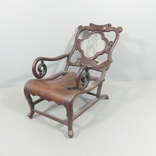 2099 - A Chinese hardwood lounge chair, with marble panelled back and carved and pierced decoration. Overal... 