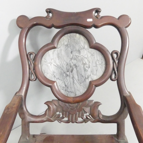 2099 - A Chinese hardwood lounge chair, with marble panelled back and carved and pierced decoration. Overal... 