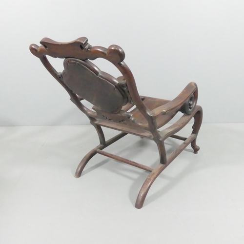 2099 - A Chinese hardwood lounge chair, with marble panelled back and carved and pierced decoration. Overal... 