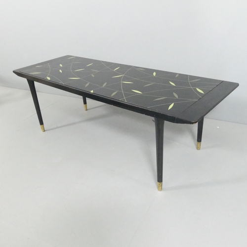 2109 - A contemporary black lacquered coffee table with inset glass panel. 130x42x46cm.