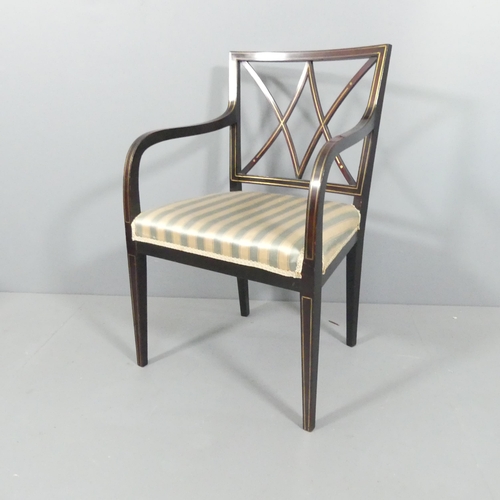 2111 - A mid-century mahogany and brass line inlaid open armchair or desk chair.