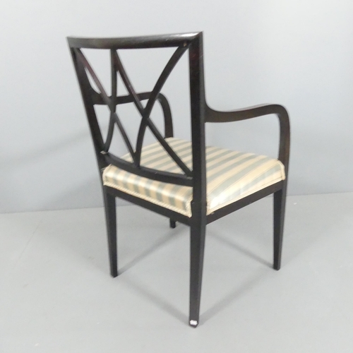 2111 - A mid-century mahogany and brass line inlaid open armchair or desk chair.