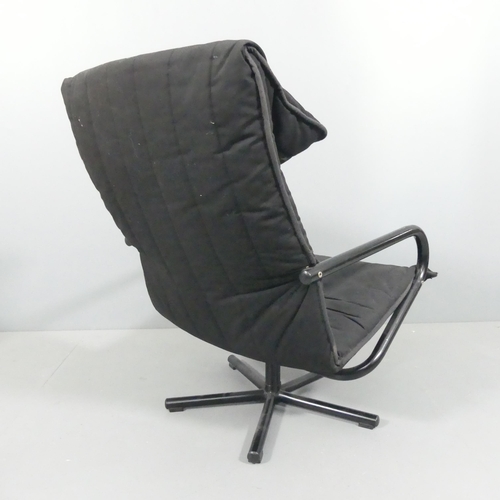 2112 - A mid-century design upholstered swivel lounge chair on tubular metal base. Overall 68x92x80cm, seat... 