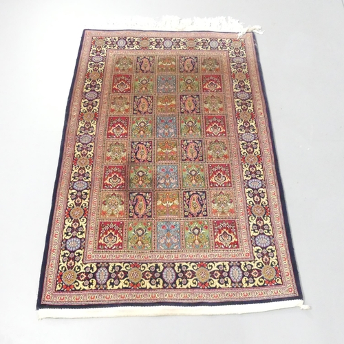 2125 - A red-ground Kurdish rug. 165x107cm.